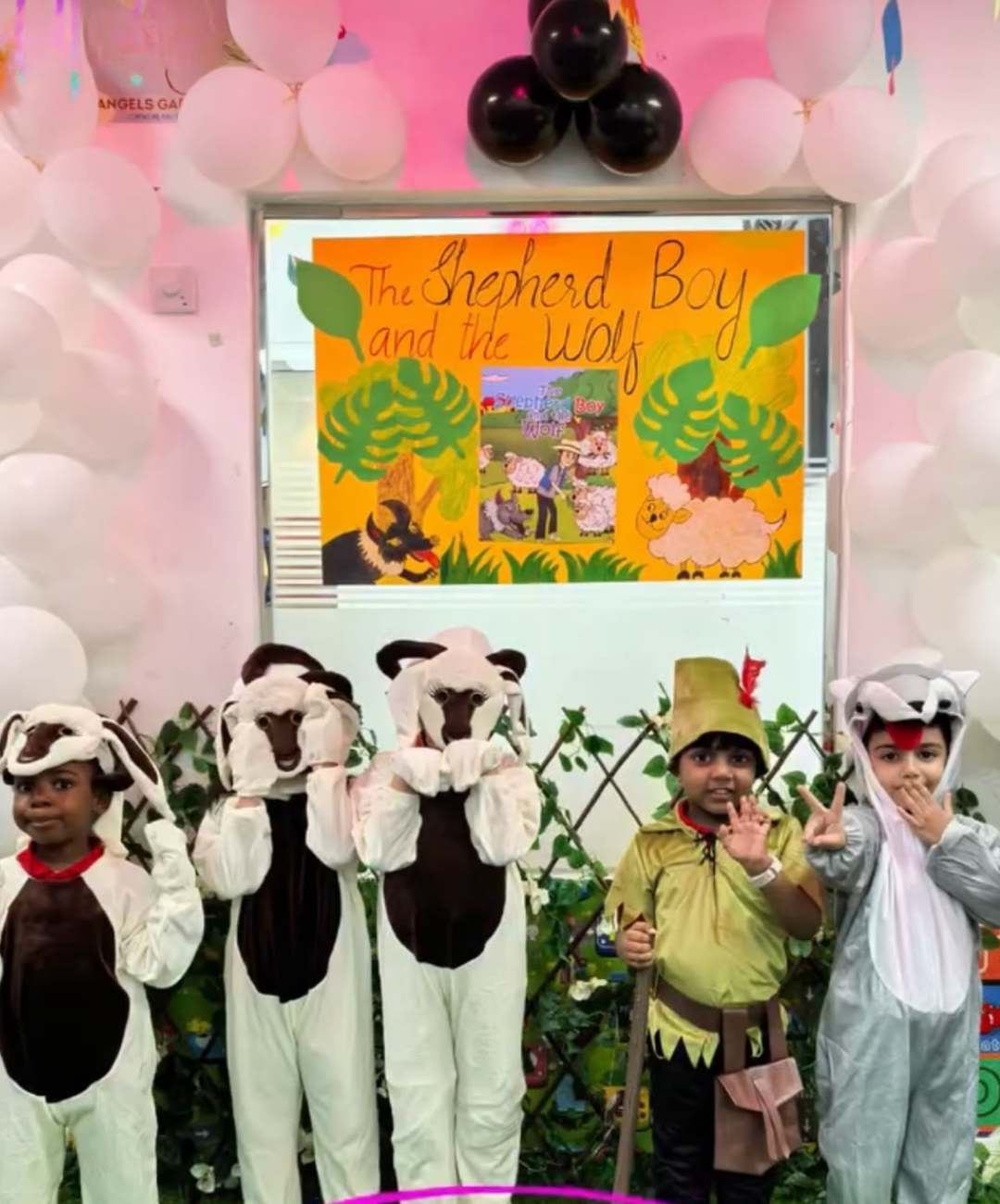 Children dressed as characters from The Shepherd Boy and the Wolf during a live storytelling session at Angels Garden