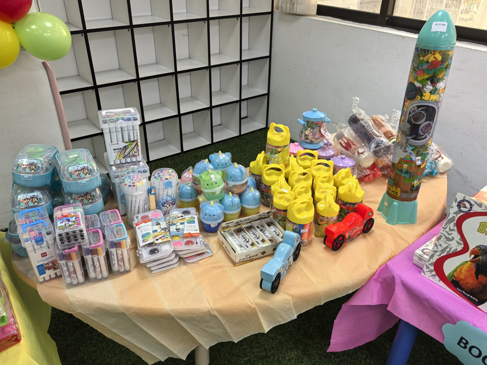 Surprise Gift Day table with toys, stationery and rewards for students